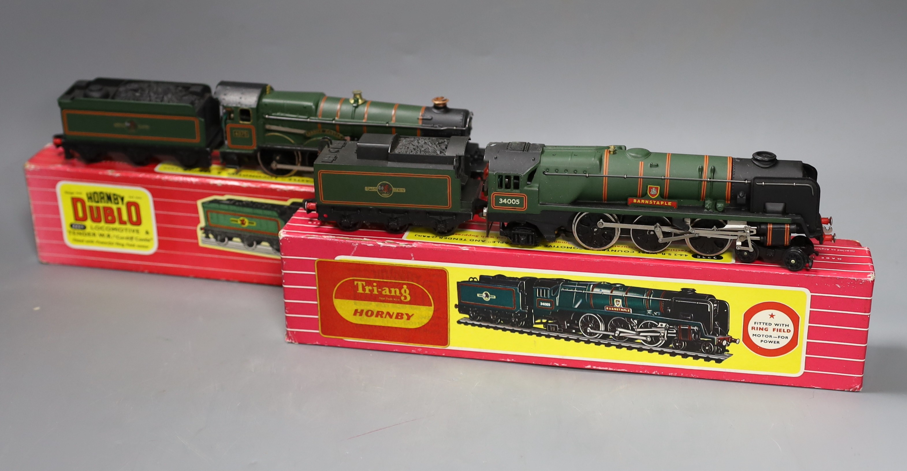 Two boxed Hornby Dublo locomotives and tenders – 2221 Cardiff Castle locomotive and tender and 2235 West Country locomotive Barnstaple and tender